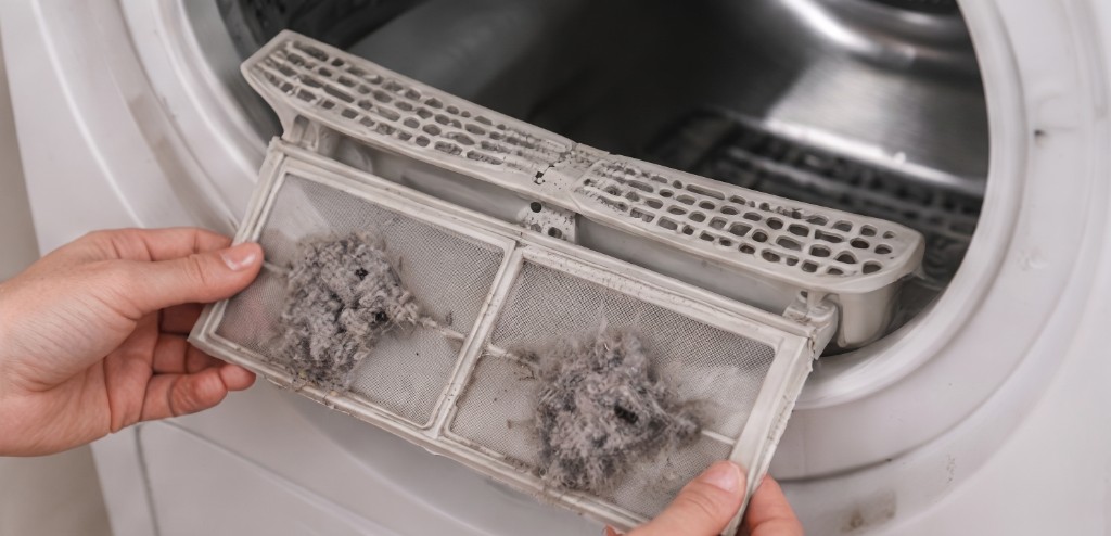Entretien du filtre à peluches d'un sèche-linge